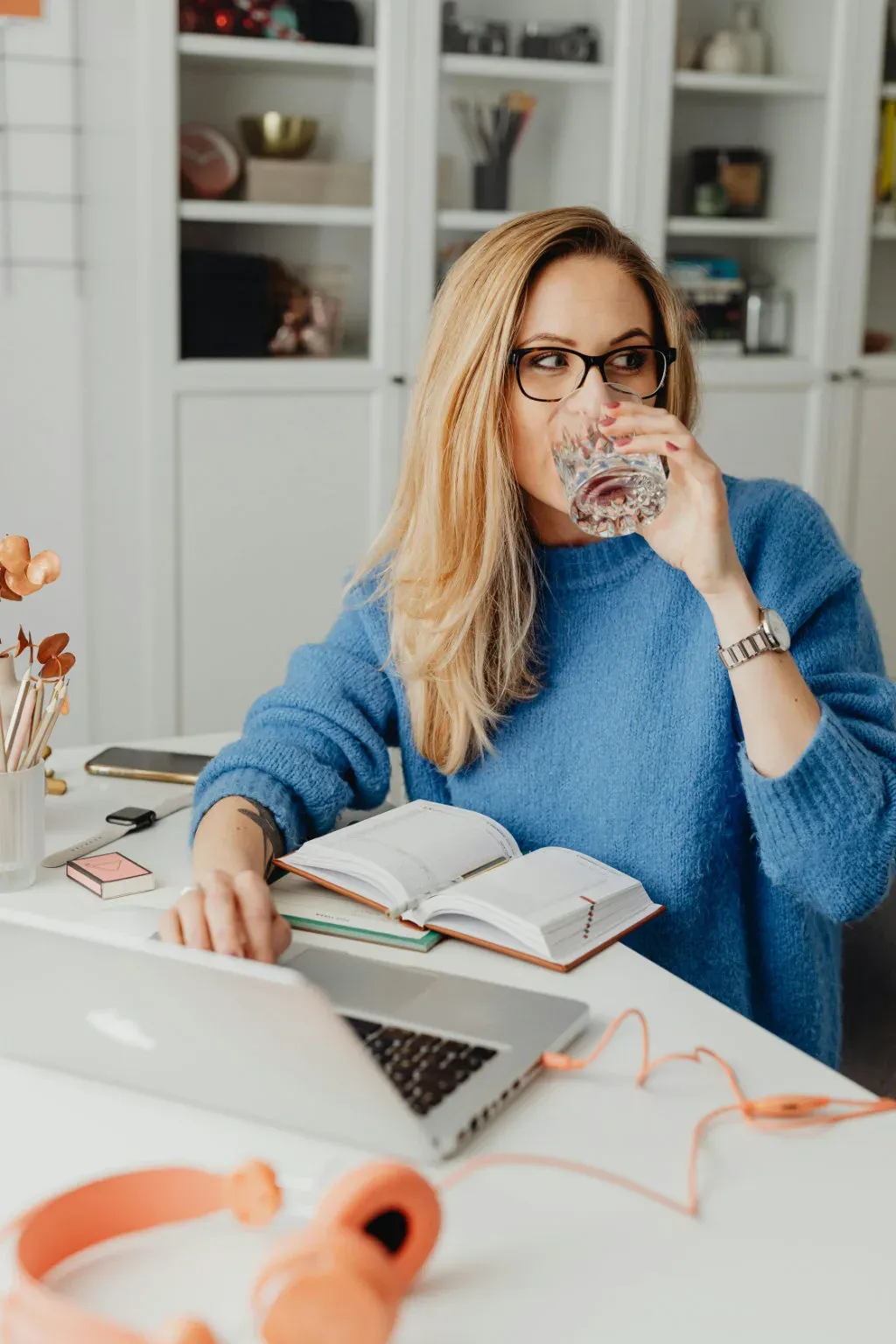 A small business owner working from her home office